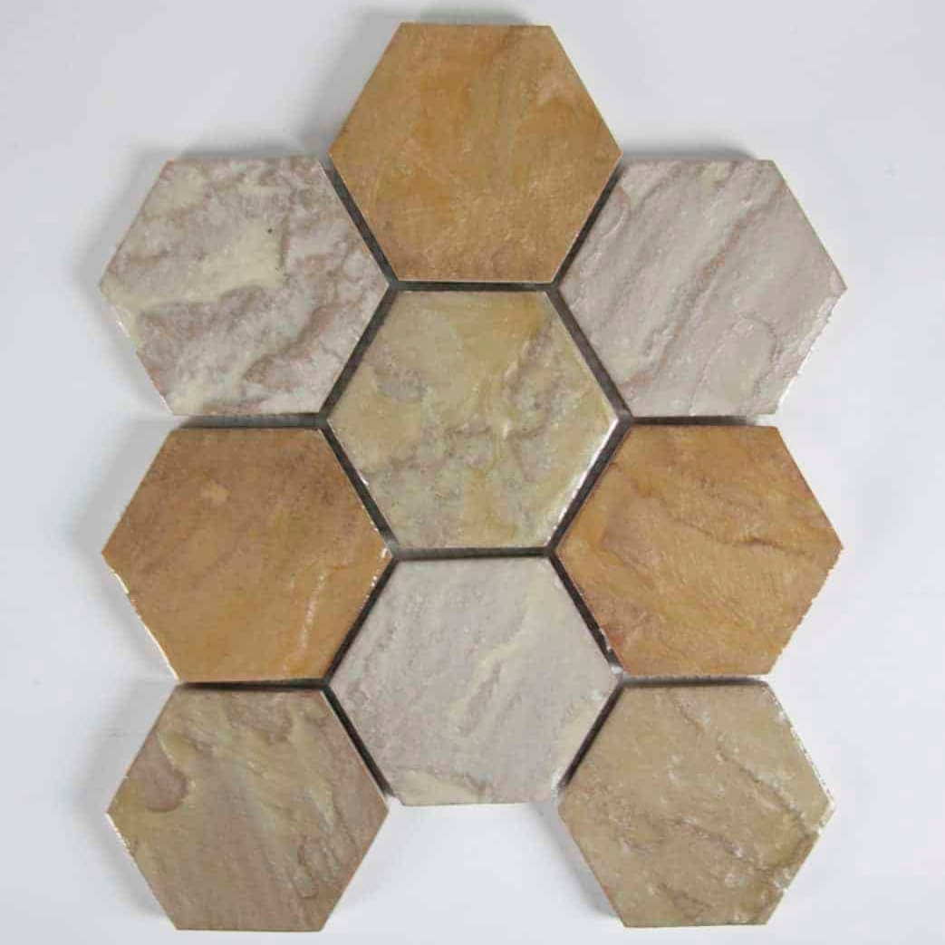 A geometric arrangement of hexagonal tiles in various shades of beige and brown, arranged in a visually appealing pattern.