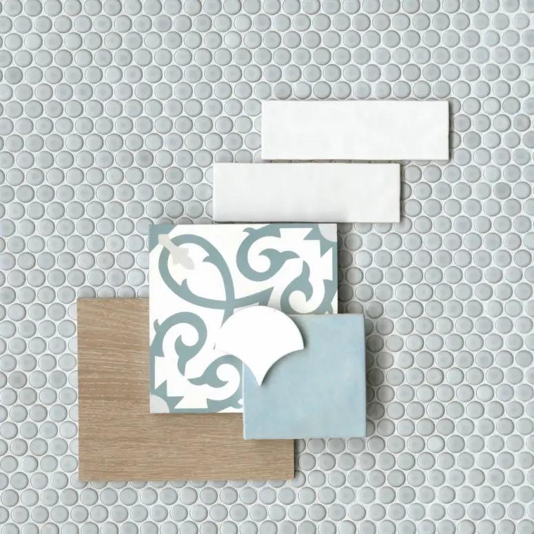 A collection of textured tiles arranged creatively, featuring geometric and ornate designs, blended with neutral and cool color palettes.