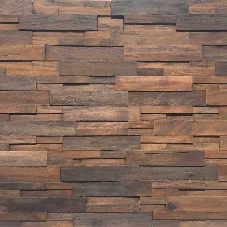 A textured wooden wall featuring various shades and lengths of wood panels arranged in a geometric pattern.