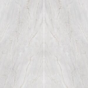 A smooth, light-colored surface with subtle veining, resembling polished marble or a similar stone material.