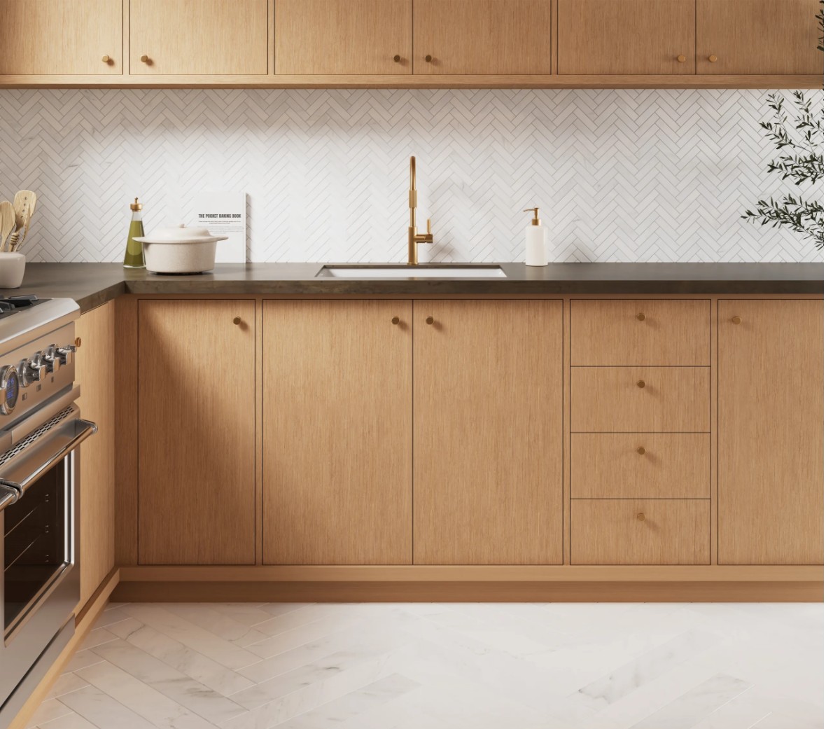 A modern kitchen featuring wooden cabinets, a dark countertop, polished appliances, and a subtle geometric tile backsplash.