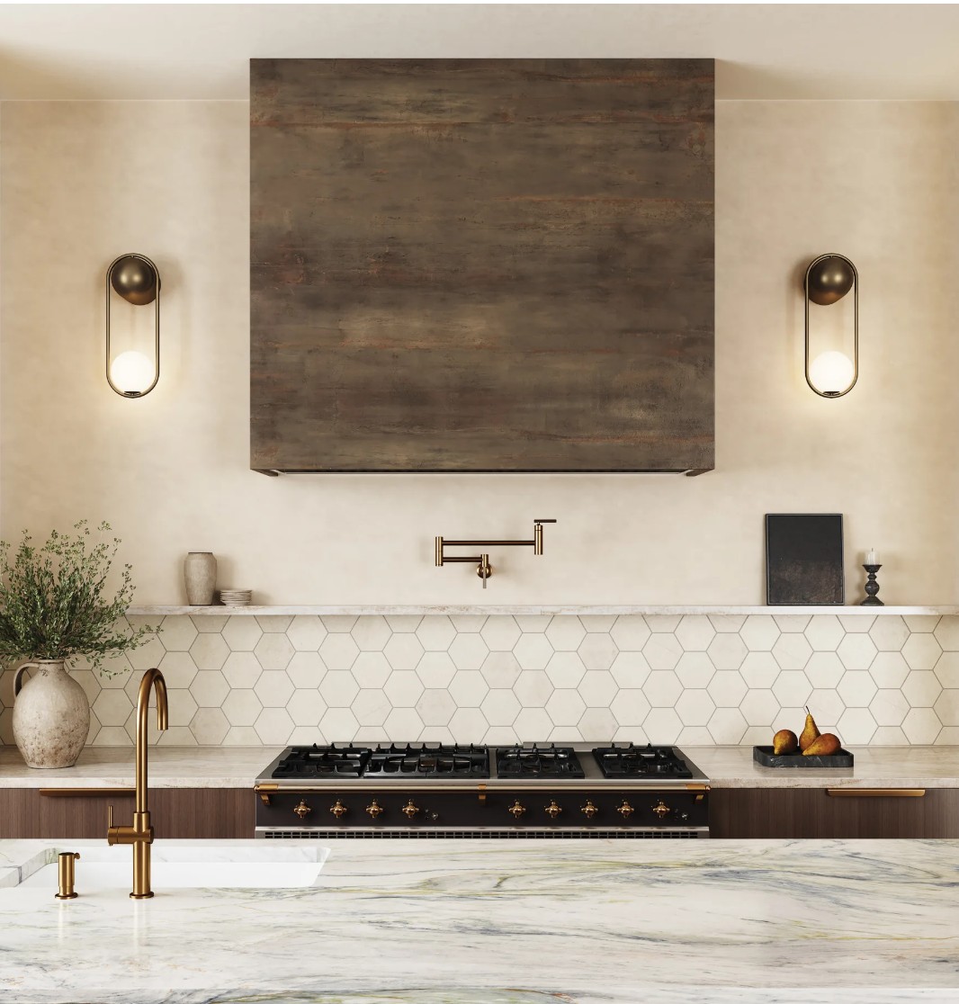 A modern kitchen featuring sleek cabinetry, a marble countertop, hexagonal backsplash, and stylish lighting fixtures.