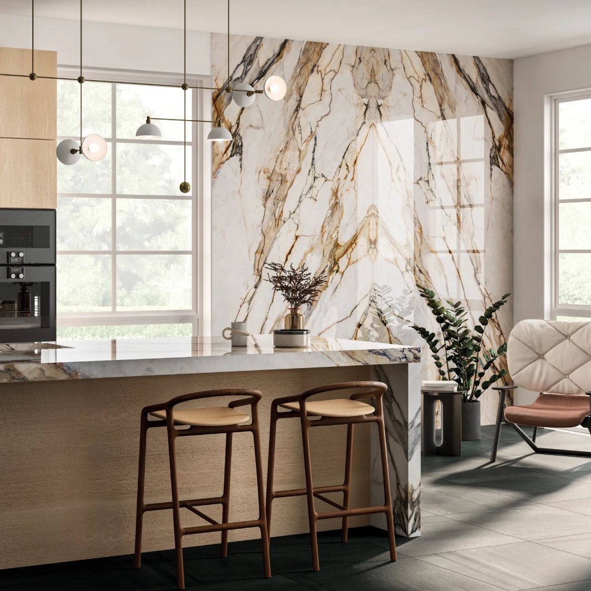 A modern kitchen featuring a marble wall, sleek countertops, stylish bar stools, and contemporary decor creating an elegant atmosphere.