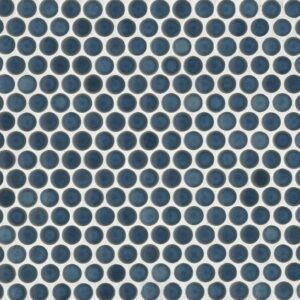 Close-up view of a tiled surface featuring small, uniform blue circles arranged in a regular pattern.