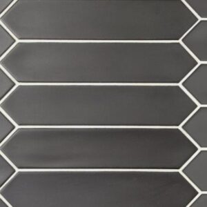 A patterned tile displaying an intricate arrangement of dark hexagonal shapes outlined in white grout.