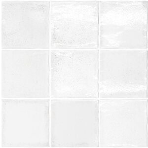 A grid of nine glossy white tiles, each having a slightly different texture and sheen, creating a uniform yet varied surface.