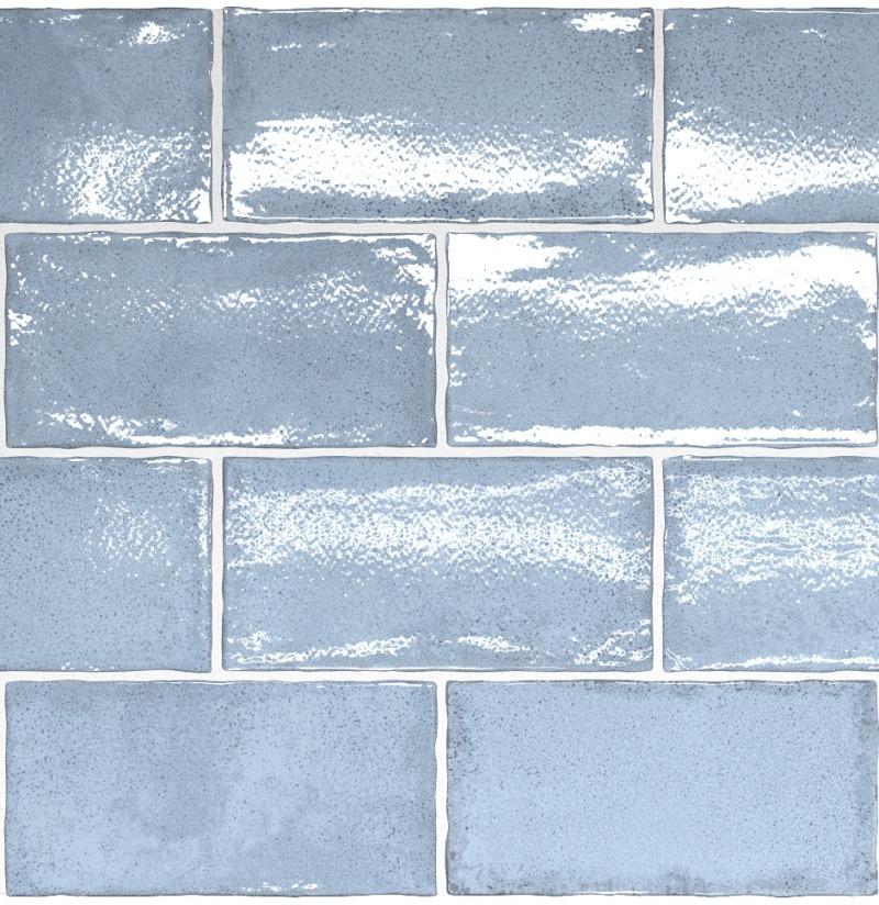 Glossy blue rectangular tiles arranged in a staggered pattern, showcasing a sleek and modern aesthetic.