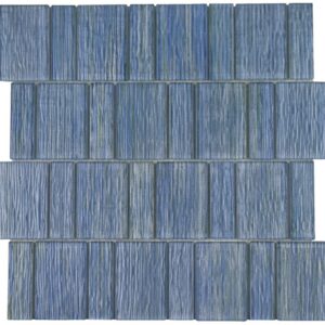 A patterned arrangement of rectangular tiles in varying shades of blue, featuring textured surfaces that create visual interest.