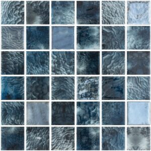A grid of textured tiles in various shades of blue and gray, creating a visually interesting pattern.