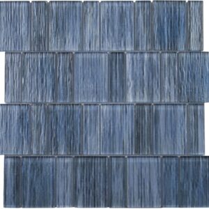 A textured arrangement of rectangular blue tiles with varying shades, creating a visually striking pattern.