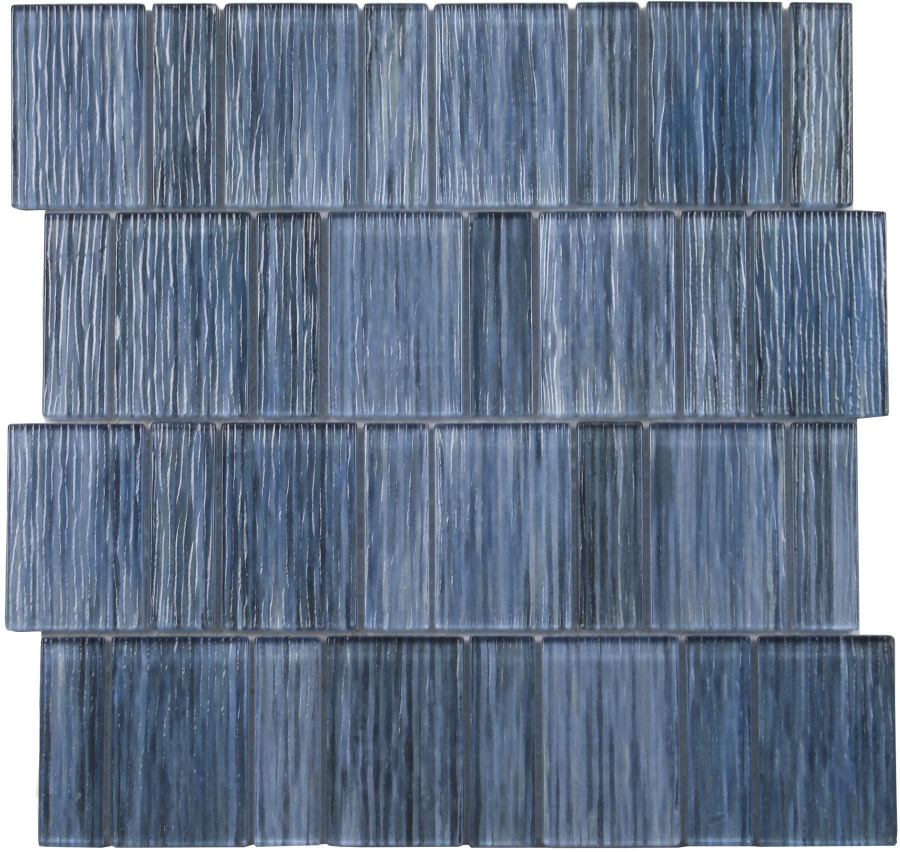 A textured arrangement of rectangular blue tiles with varying shades, creating a visually striking pattern.